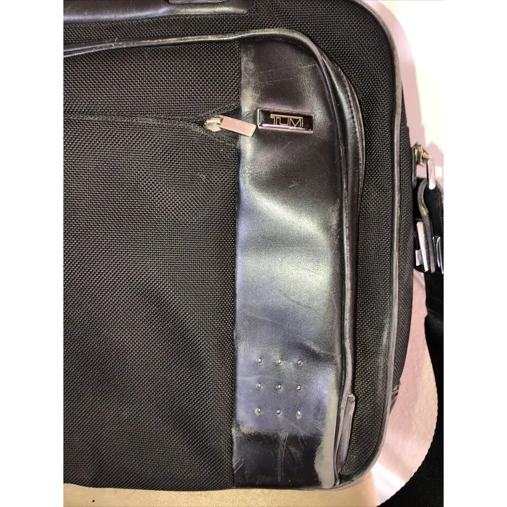 Tumi expandable leather